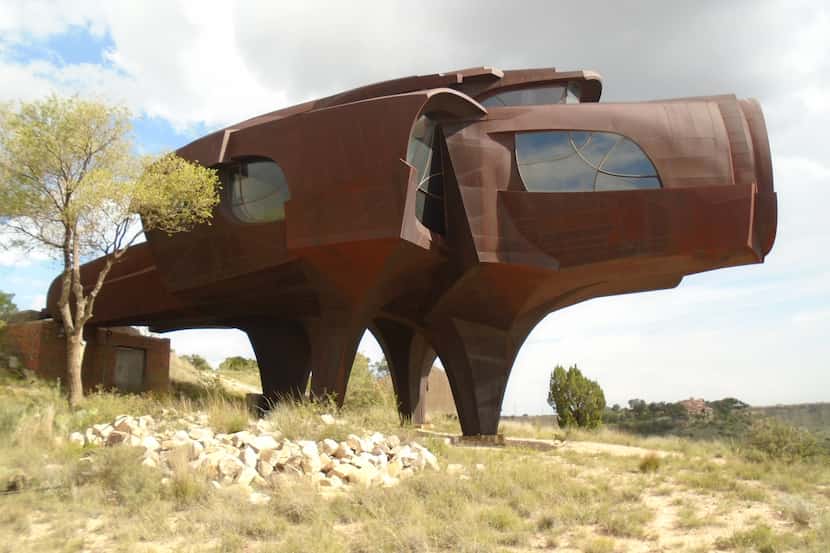 The Robert Bruno Steel House is literally a work of art perched over a lake in Ransom Canyon...