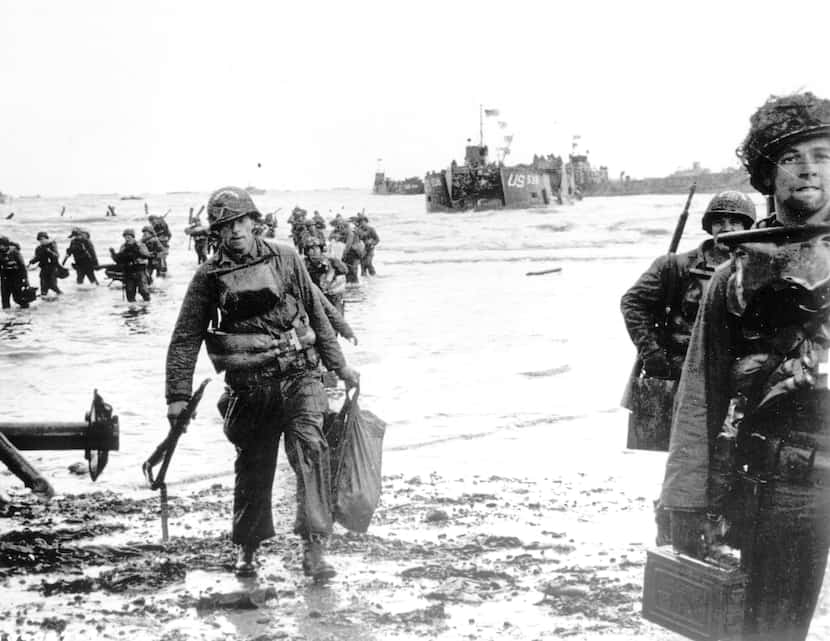 American assault troops move onto Omaha Beach on D-Day, June 6, 1944.