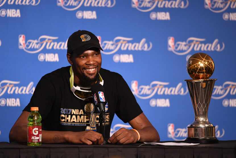 OAKLAND, CA - JUNE 12:  Kevin Durant #35 of the Golden State Warriors speaks at the press...