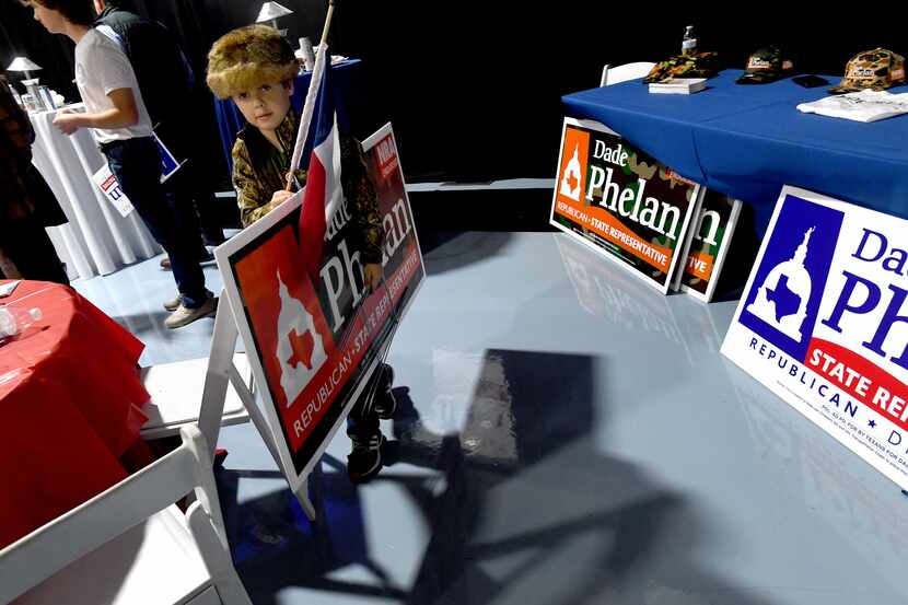 Yard signs and more were available for supporters during a Dade Phelan campaign rally in...