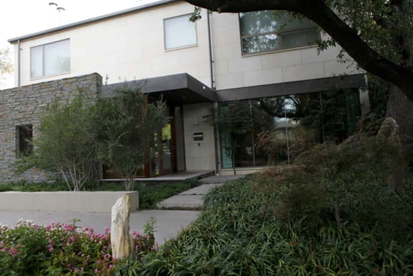 The outside of the home of D'Andra Simmons and Jeremy Lock in Dallas. The contemporary home...