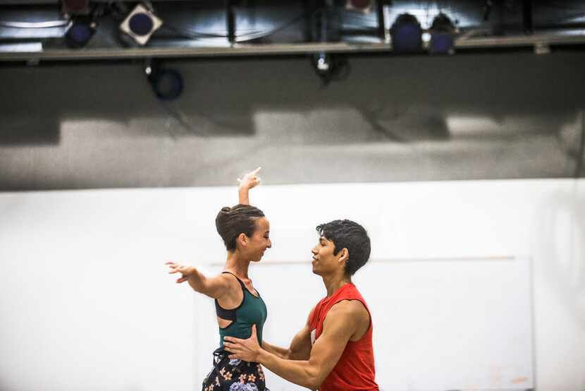 Amanda Fairweather of Texas Ballet Theater is held up by Bruce Wood Dance's Adrián Aguirre...