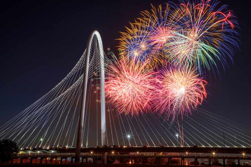 Fireworks exploded over the Margaret Hunt Hill Bridge during the Red, White, and Boom on the...