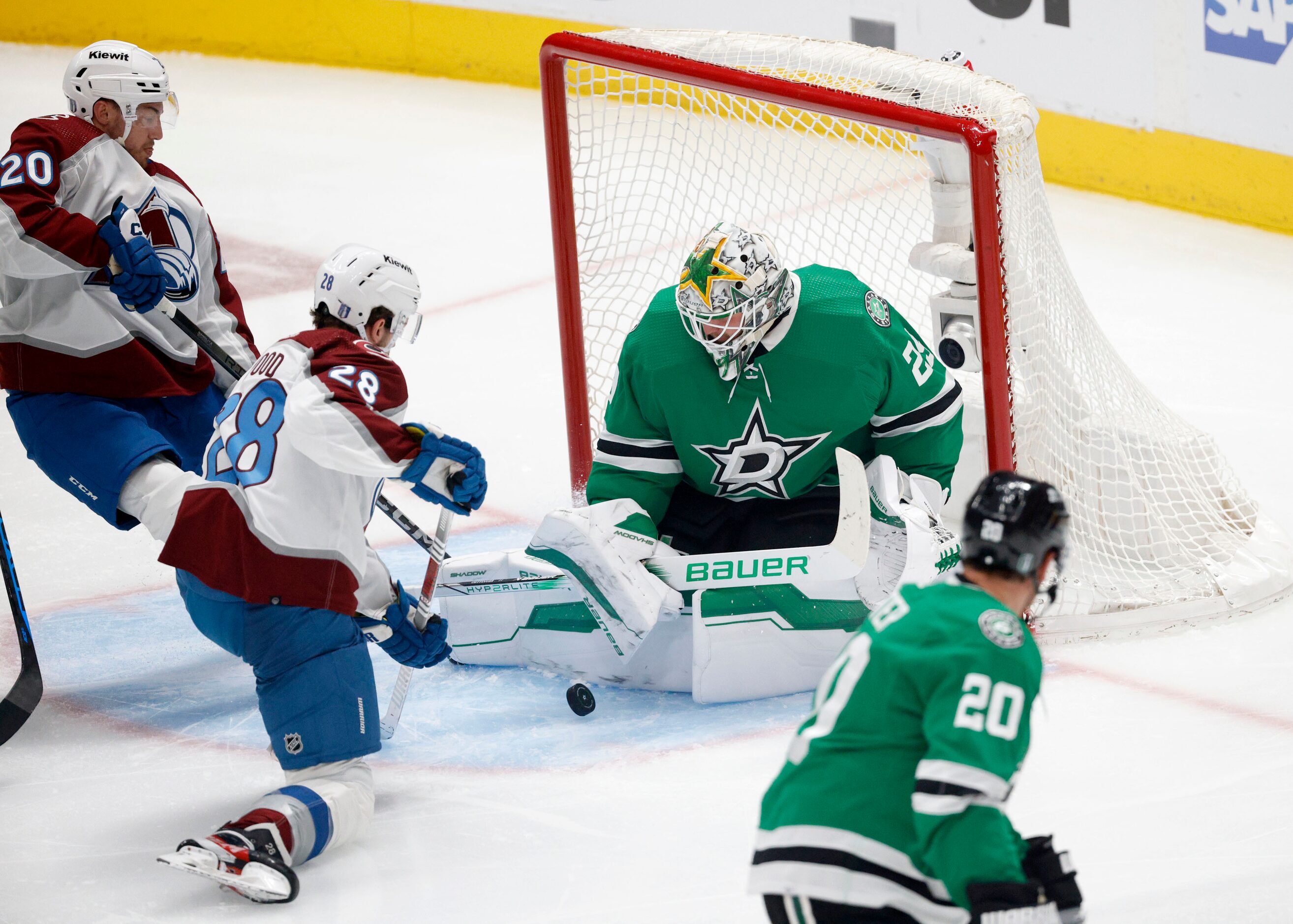 Dallas Stars goaltender Jake Oettinger (29) makes a save against Colorado Avalanche center...