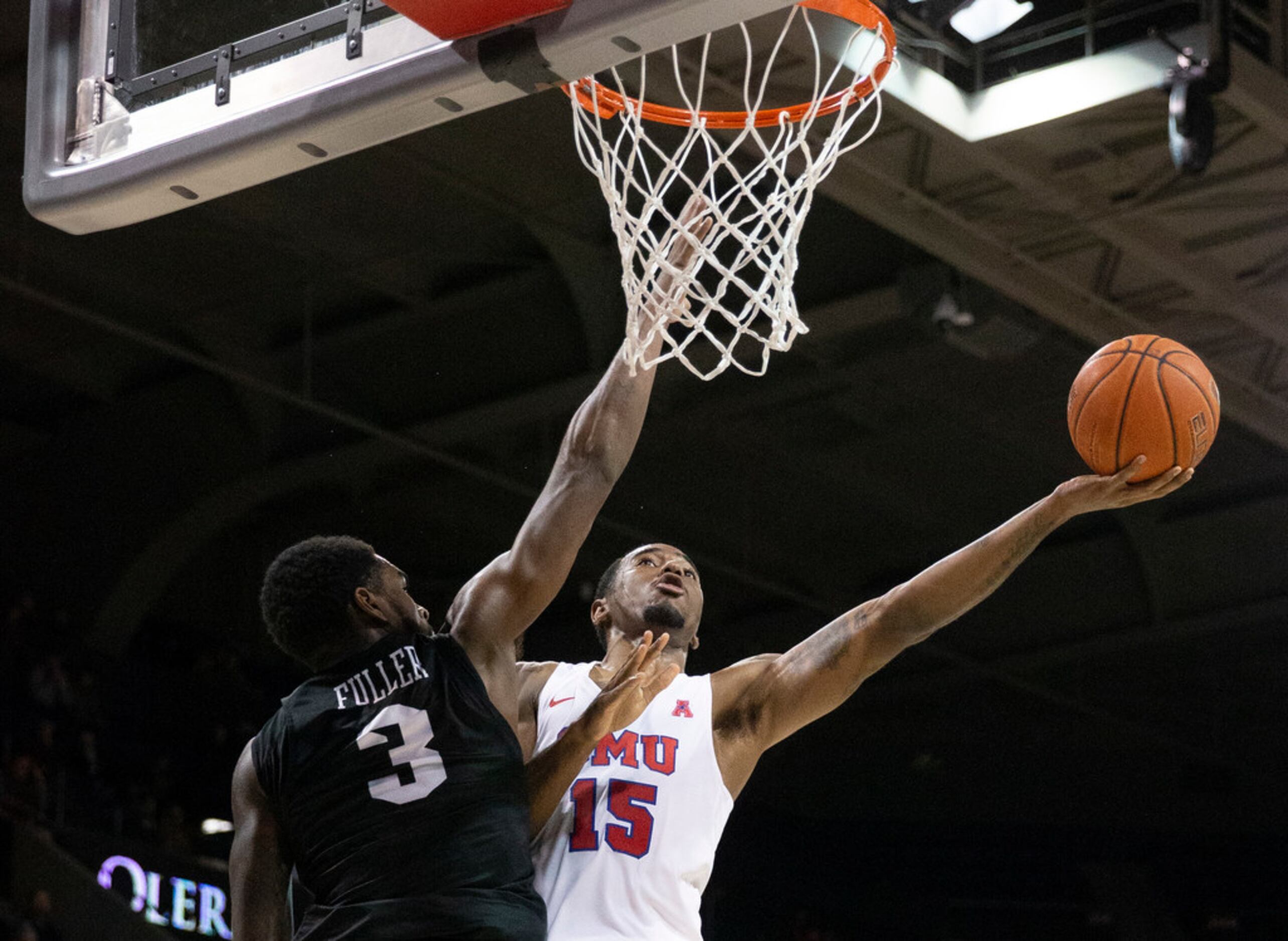 Southern Methodist Mustangs forward Isiaha Mike (15) tries to make a shot against UCF...