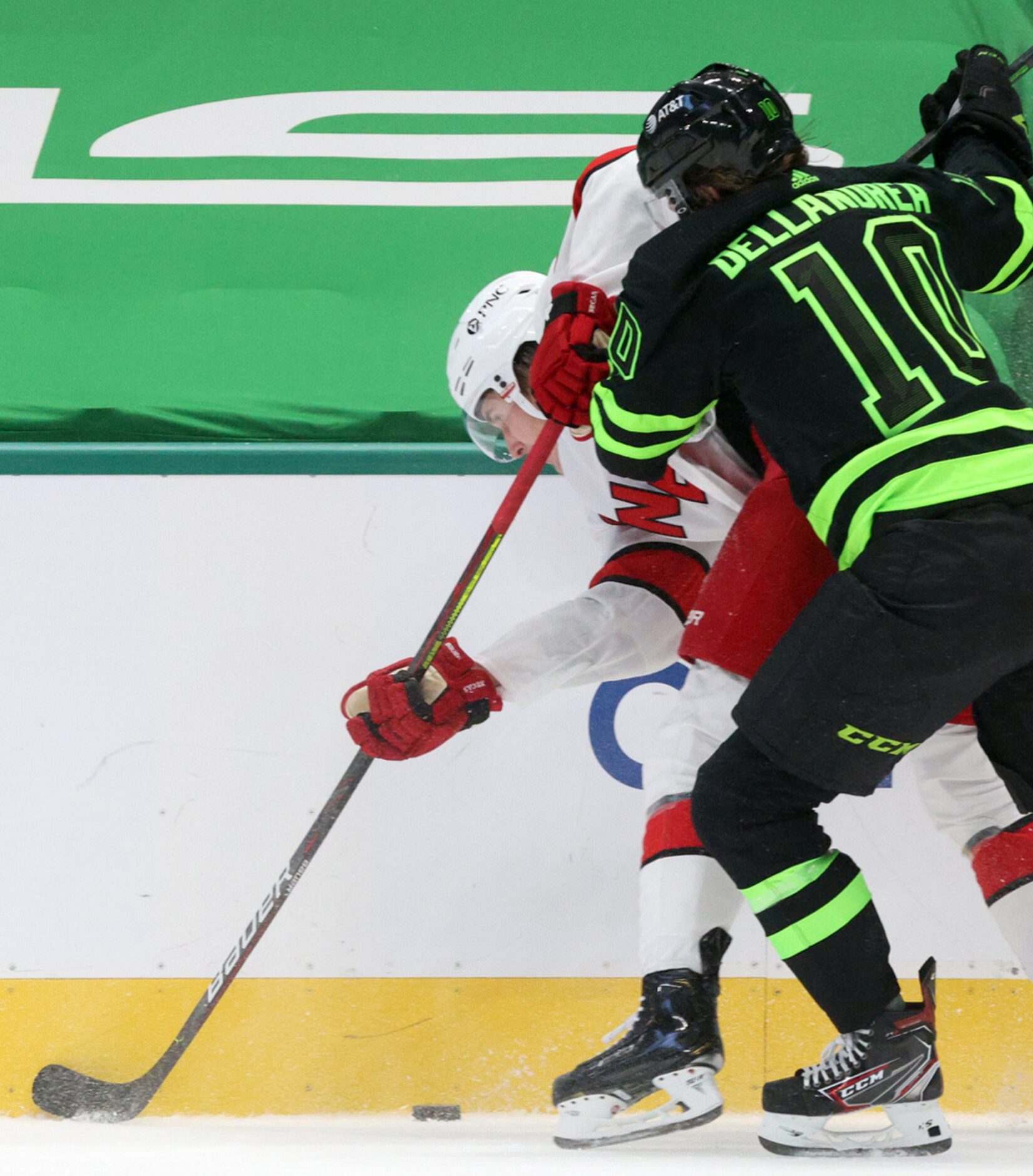 Dallas Stars center Ty Dellandrea (10) pins Carolina Hurricanes center Martin Necas (88)...