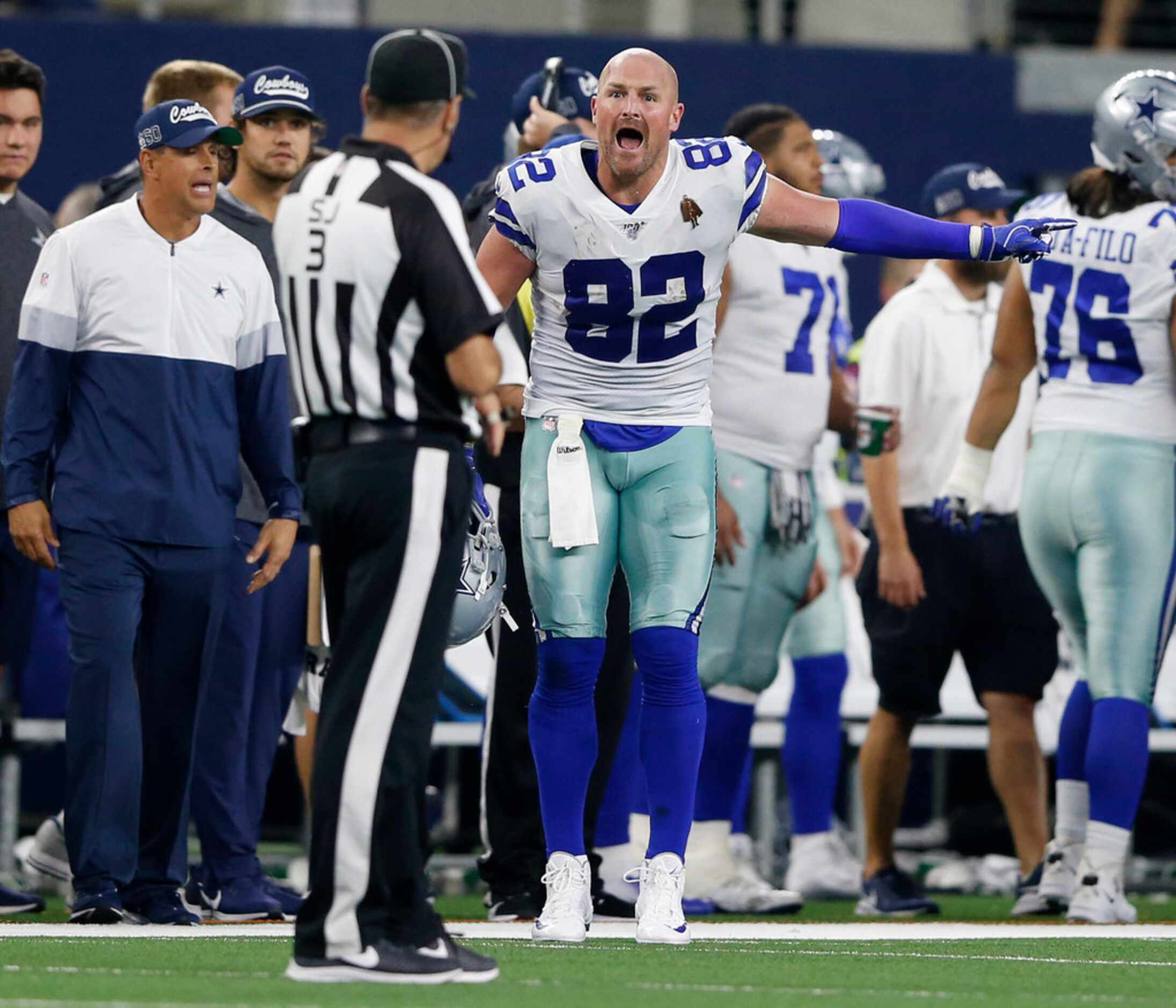 Dallas Cowboys tight end Jason Witten (82) argues with side judge Scott Edwards (3) during...