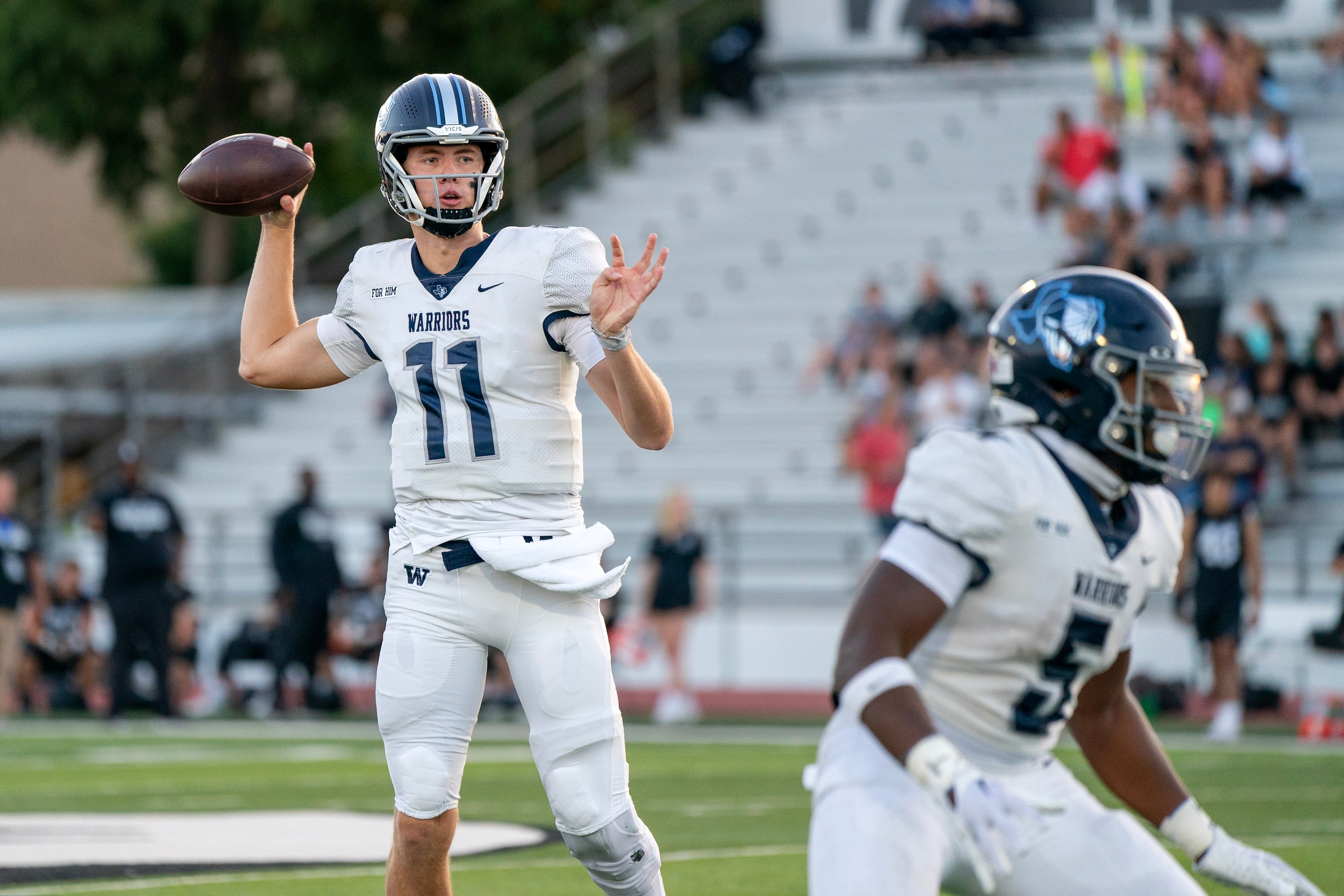 Argyle Liberty Christian senior quarterback Cole Welliver (11) throws a pass as junior...