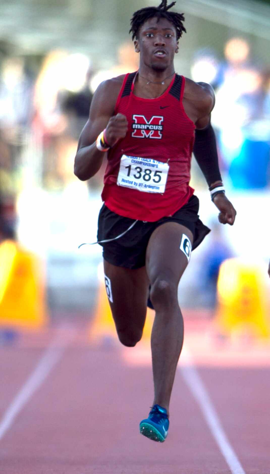 Flower Mound Marcus sprinter Michael Sturdivant finishes strong to win the Class 6A Boys 100...