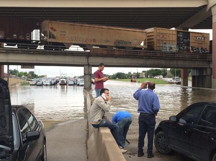 Commuters stranded on northbound Loop 12 at I-30 Friday morning. Heavy rain overnight...
