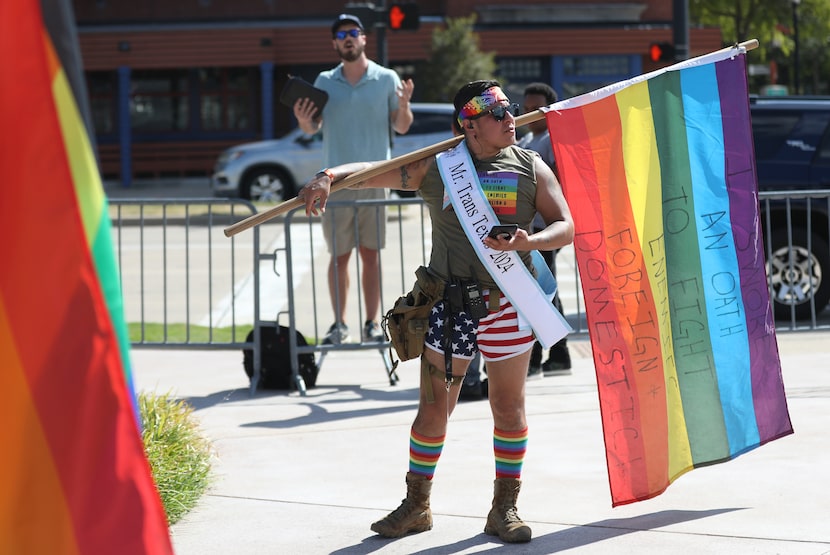 Guy Pena, w ith Veterans for Equality, stands outside of Pride Frisco Fest at Toyota Stadium...