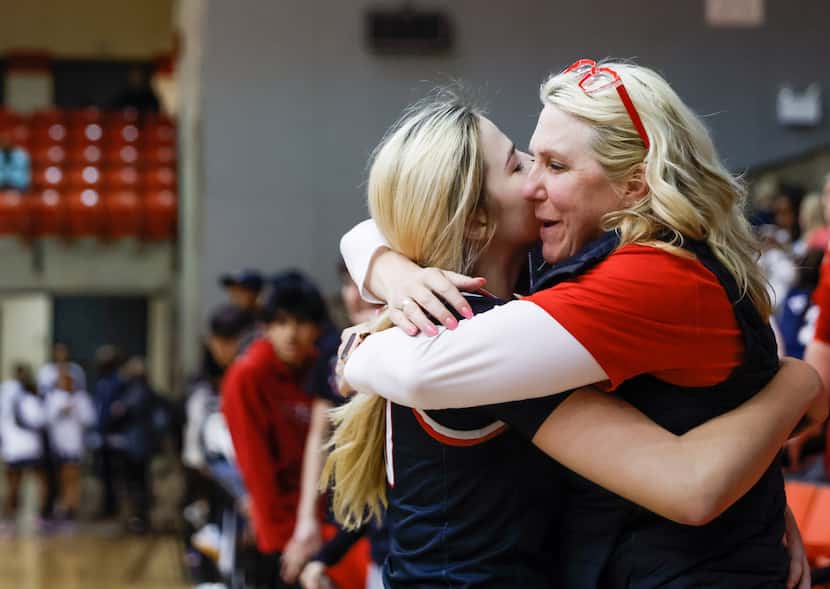 Coppell senior guard Julianna LaMendola (20) and mother Janice LaMedola embrace after...