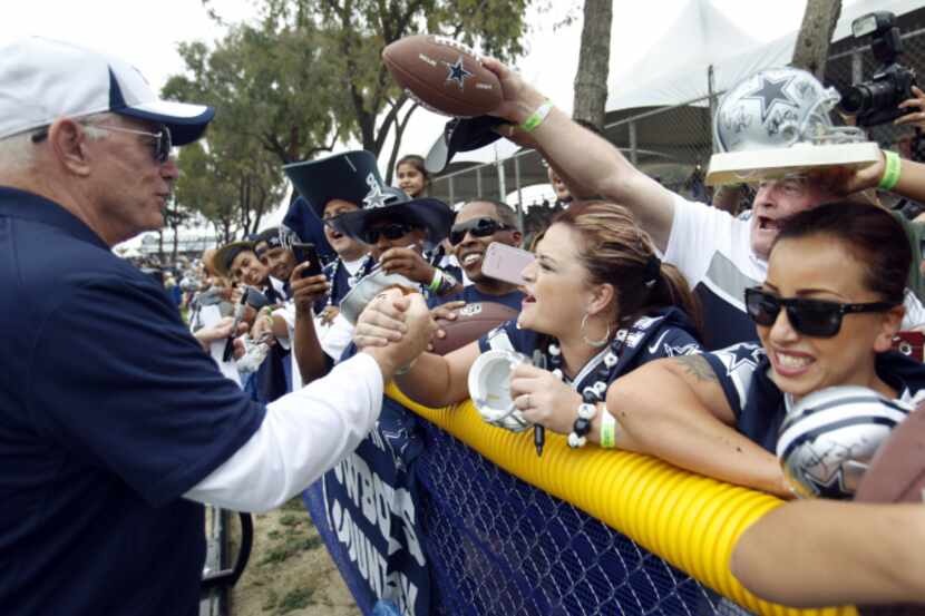Lindsey Smith of Palmdale, California shakes hands with Dallas Cowboys owner Jerry Jones...