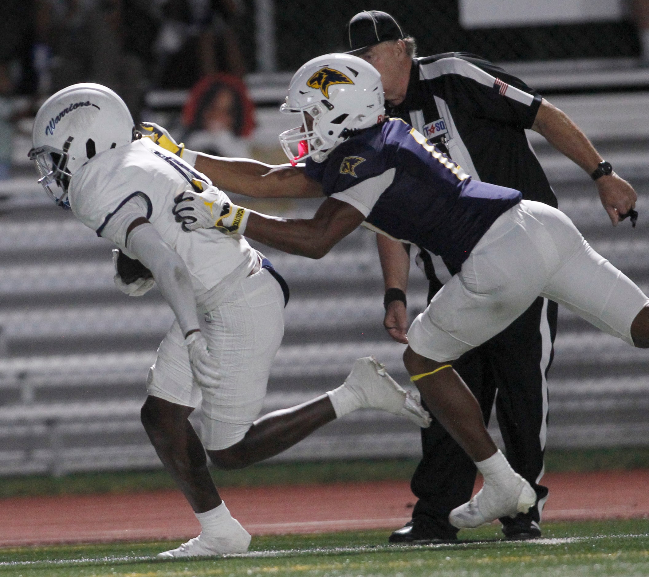 Argyle Liberty Christian receiver Jaylon Hawkins (4), left, pulls in a long pass from fellow...