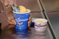 Ben Van Leeuwen scoops Kraft Mac & Cheese flavored ice cream Wednesday, May 15, 2024, in the...