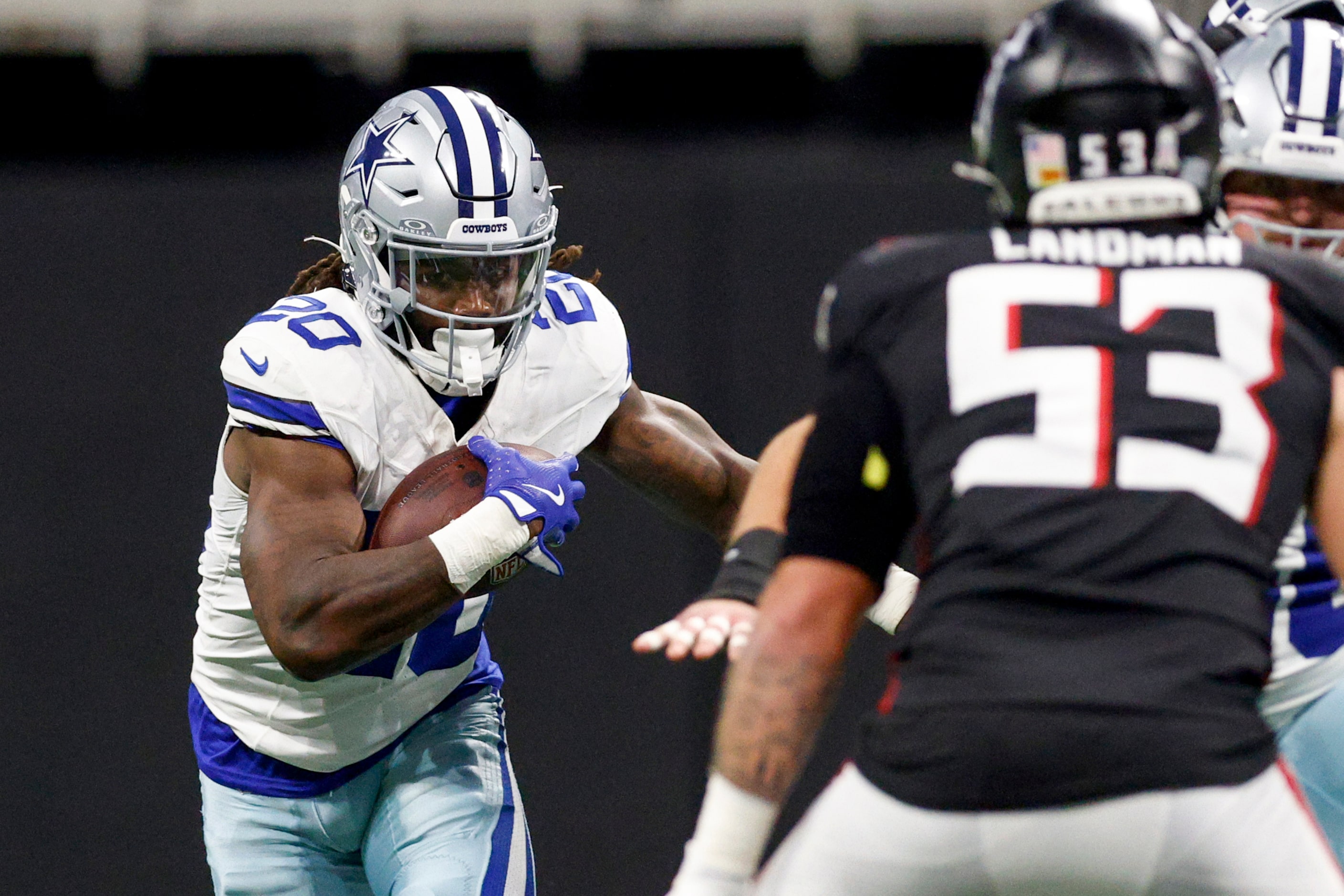 Dallas Cowboys running back Dalvin Cook (20) runs the ball during the second half against...