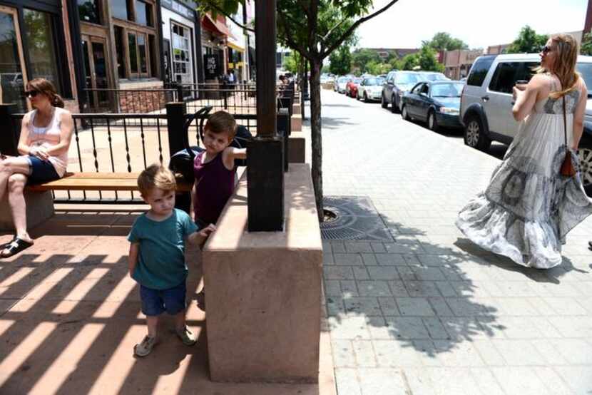 
Brothers Jasper Gooden, 2, and Felix Gooden, 4, stand outside Steel City Pops on Lower...