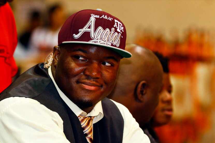 Feb 4, 2015; Gladewater, TX, USA; Daylon Mack with Texas A&M hat on as he selects the Texas...