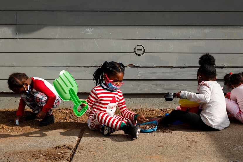 Children play outside at Child Care Group's Landauer Center. Dallas ISD wants to partner...