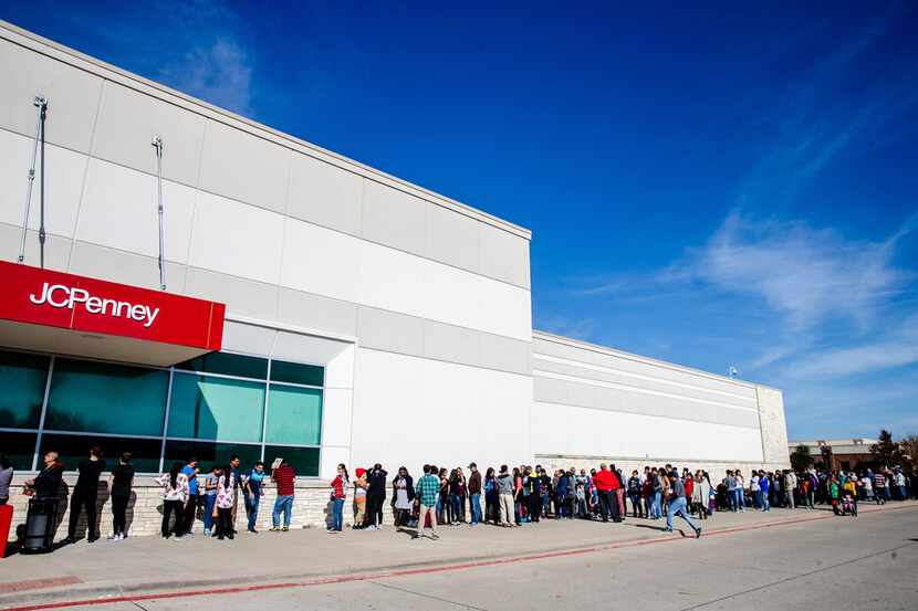Shoppers line up outside J.C. Penney for Thanksgiving Day shopping in Fairview.