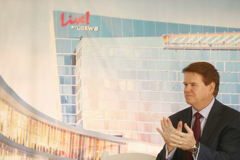 Arlington Mayor Jeff Williams applauds during a groundbreaking ceremony for Live! by Loews,...