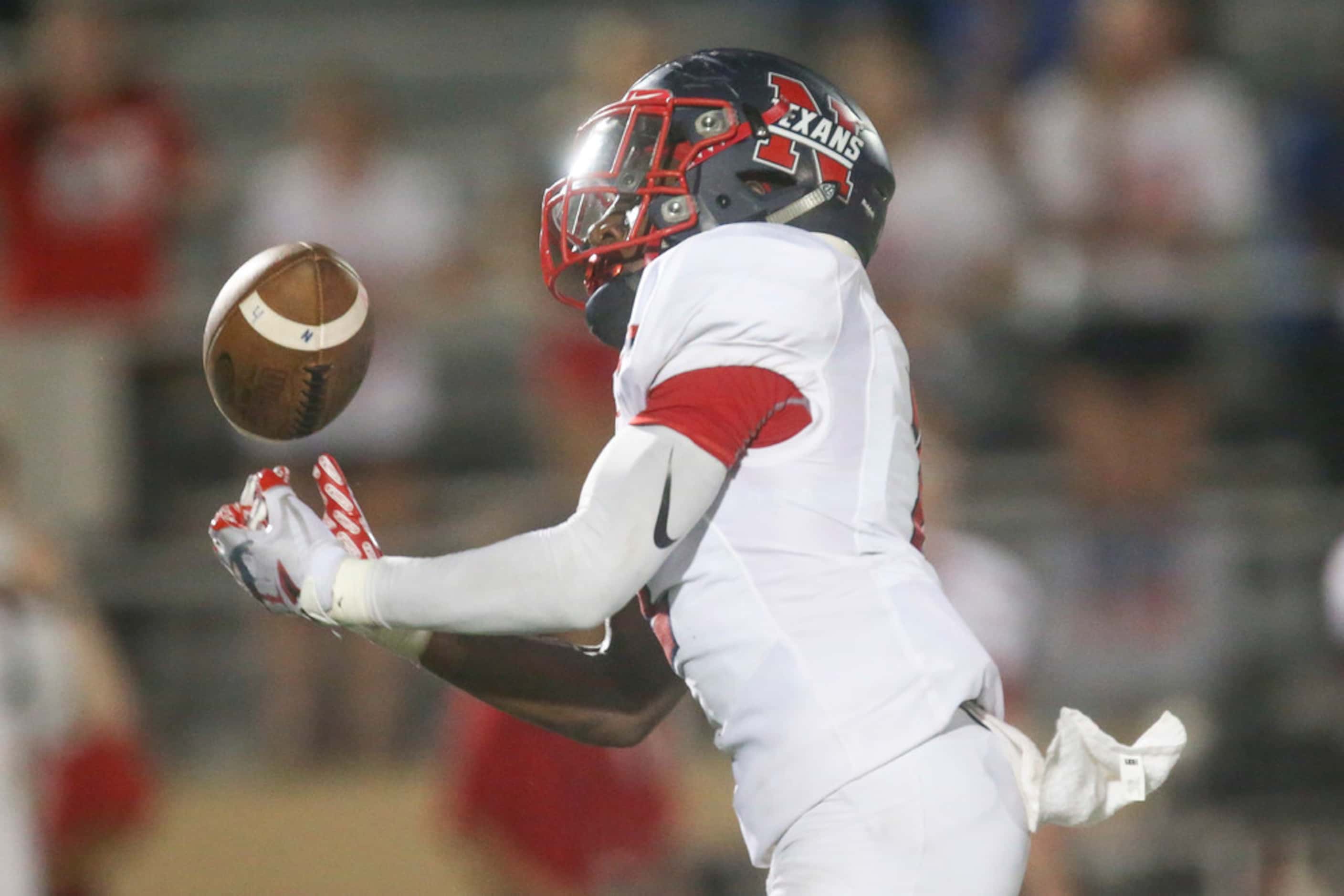 Northwest wide receiver Zavion Taylor (2) bobbles the ball during the second half of a high...
