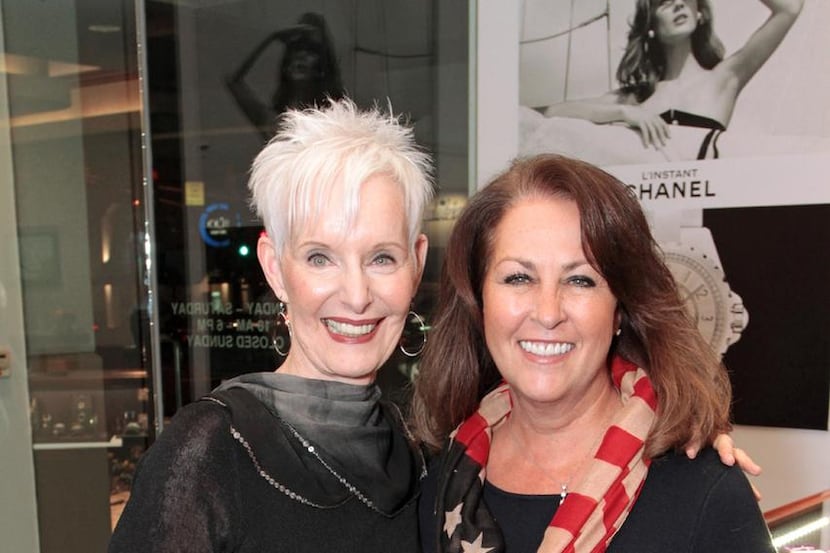 
Lyn Berman (left), founder and executive director of Attitudes & Attire, with retired Brig....