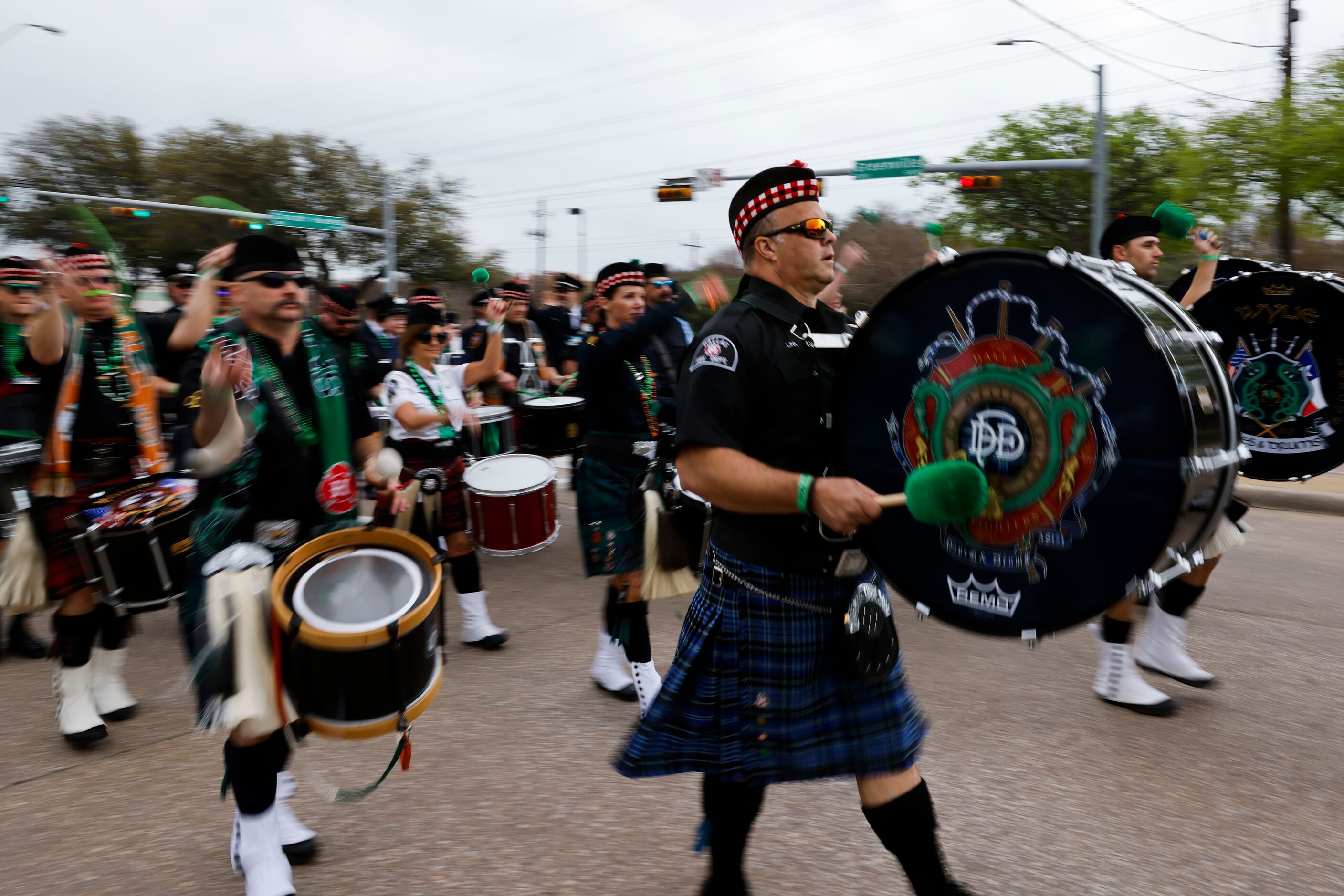 Dallas Firefighters Pipes and Drums marches along Greenville Ave during a Saint Patrick's...