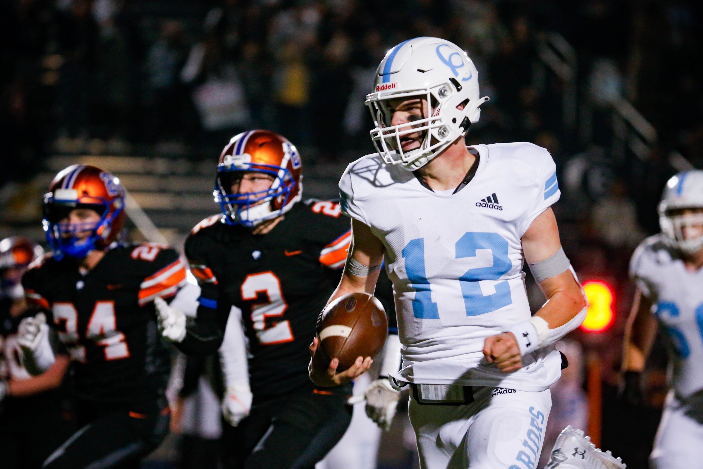 Cypress Christian's quarterback Maxwell Landrum (12) runs in for a touchdown against...