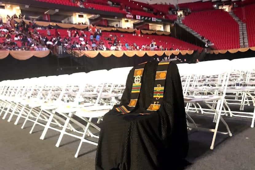 In the photo provided by Neal Augenstein, WTOP, Richard Collins III's graduation gown draped...