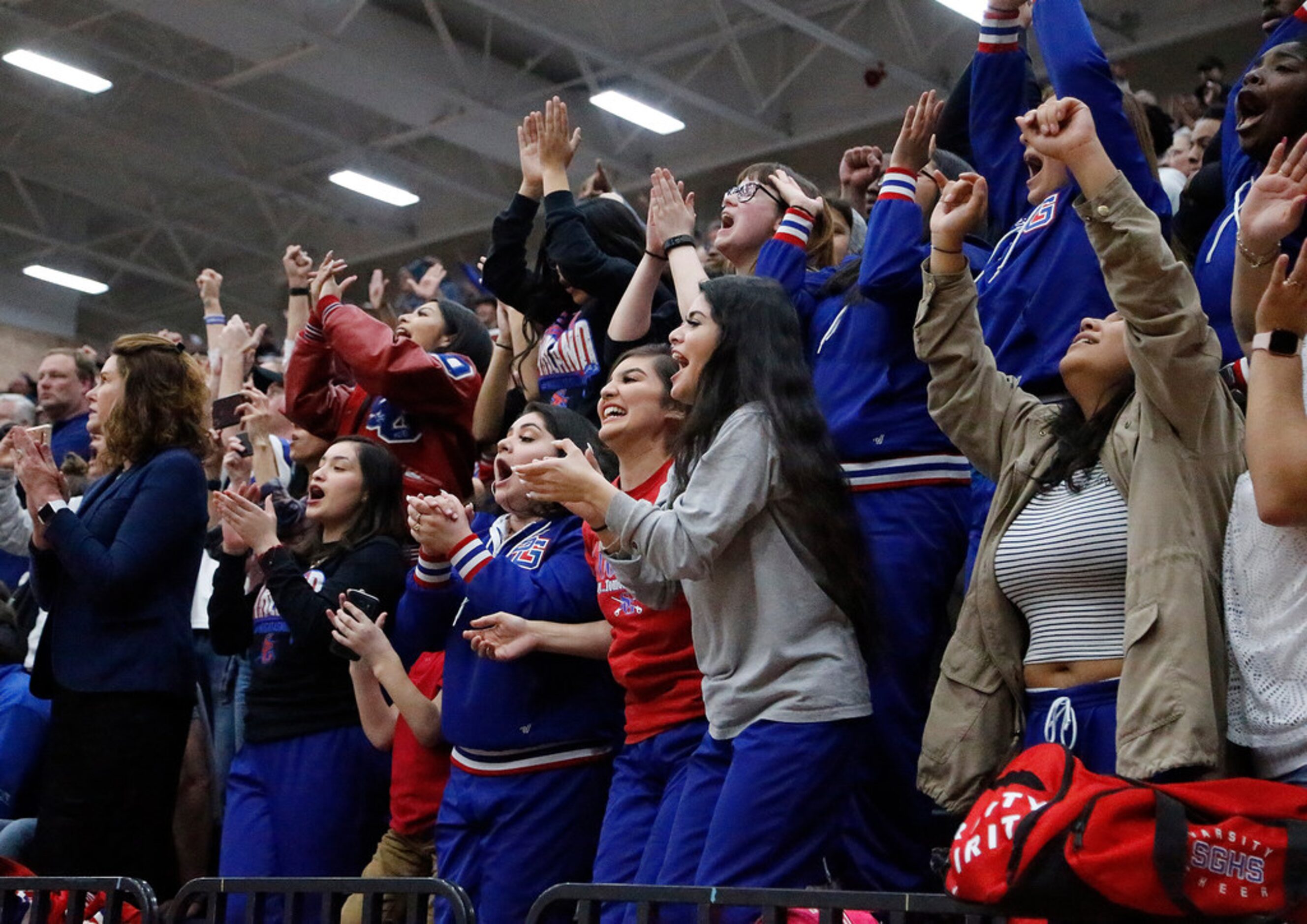 South Garland students react as they get control of the game with time running out during...