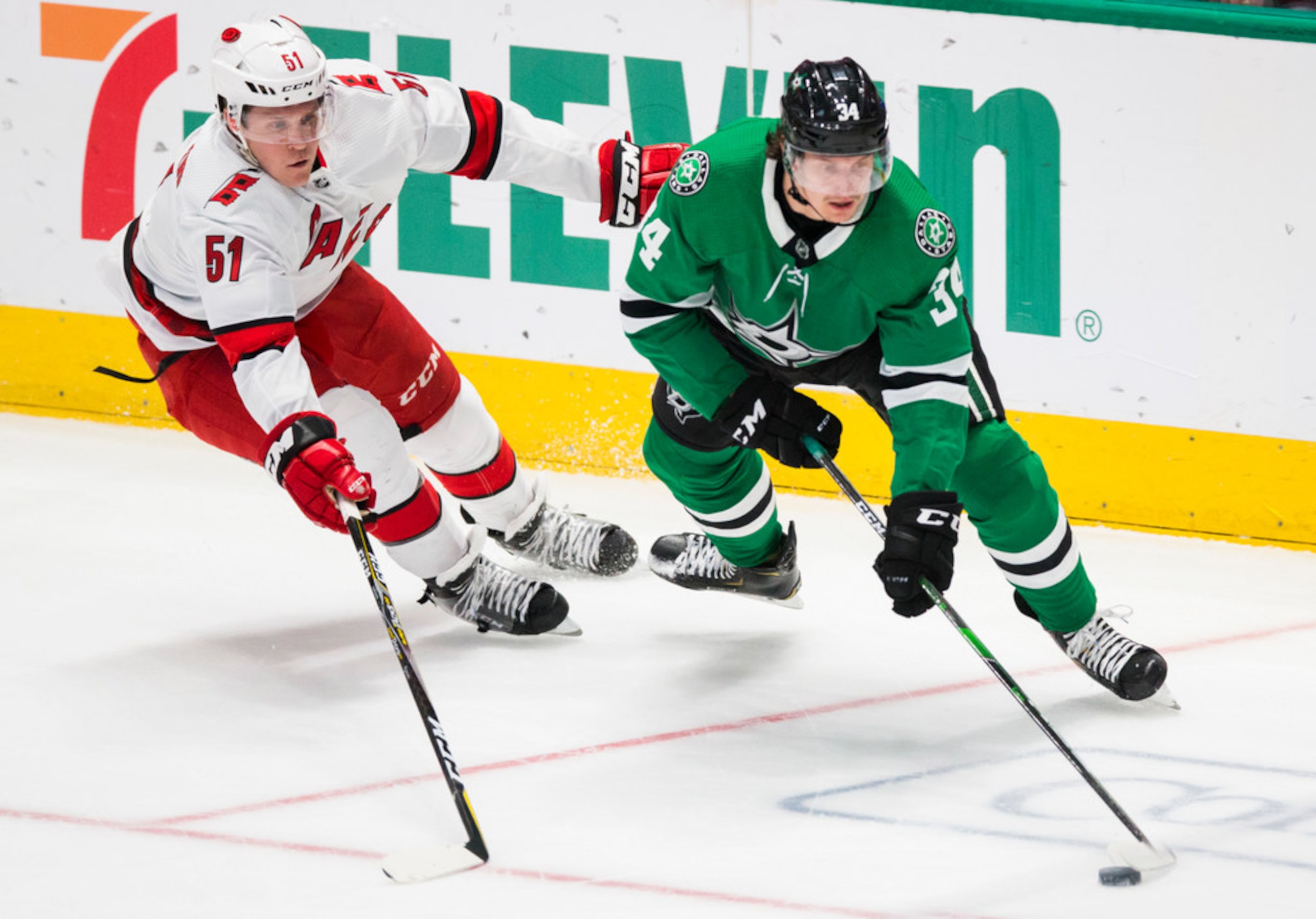 Dallas Stars right wing Denis Gurianov (34) gets ahead of Carolina Hurricanes defenseman...