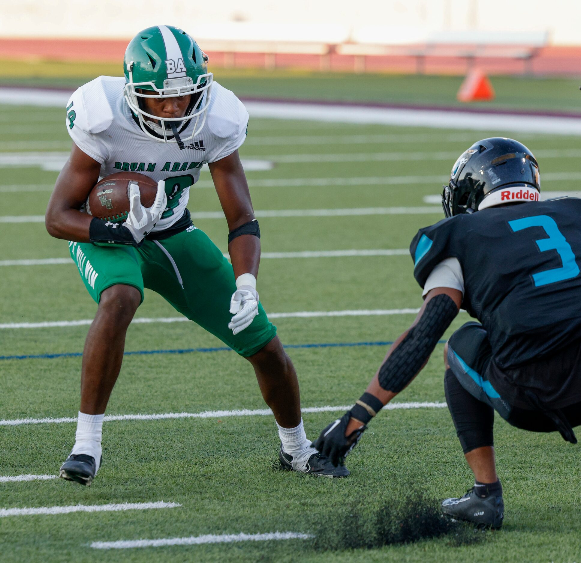 Bryan Adams running back Jon’Trevious Nunn (19) runs around Molina defensive back Glen...