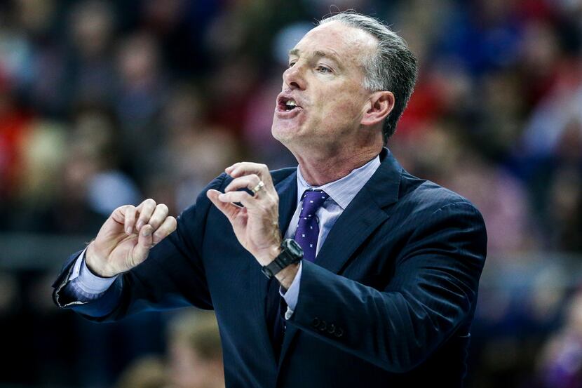 TCU Horned Frogs head coach Jamie Dixon calls a play from during an NCAA basketball game at...