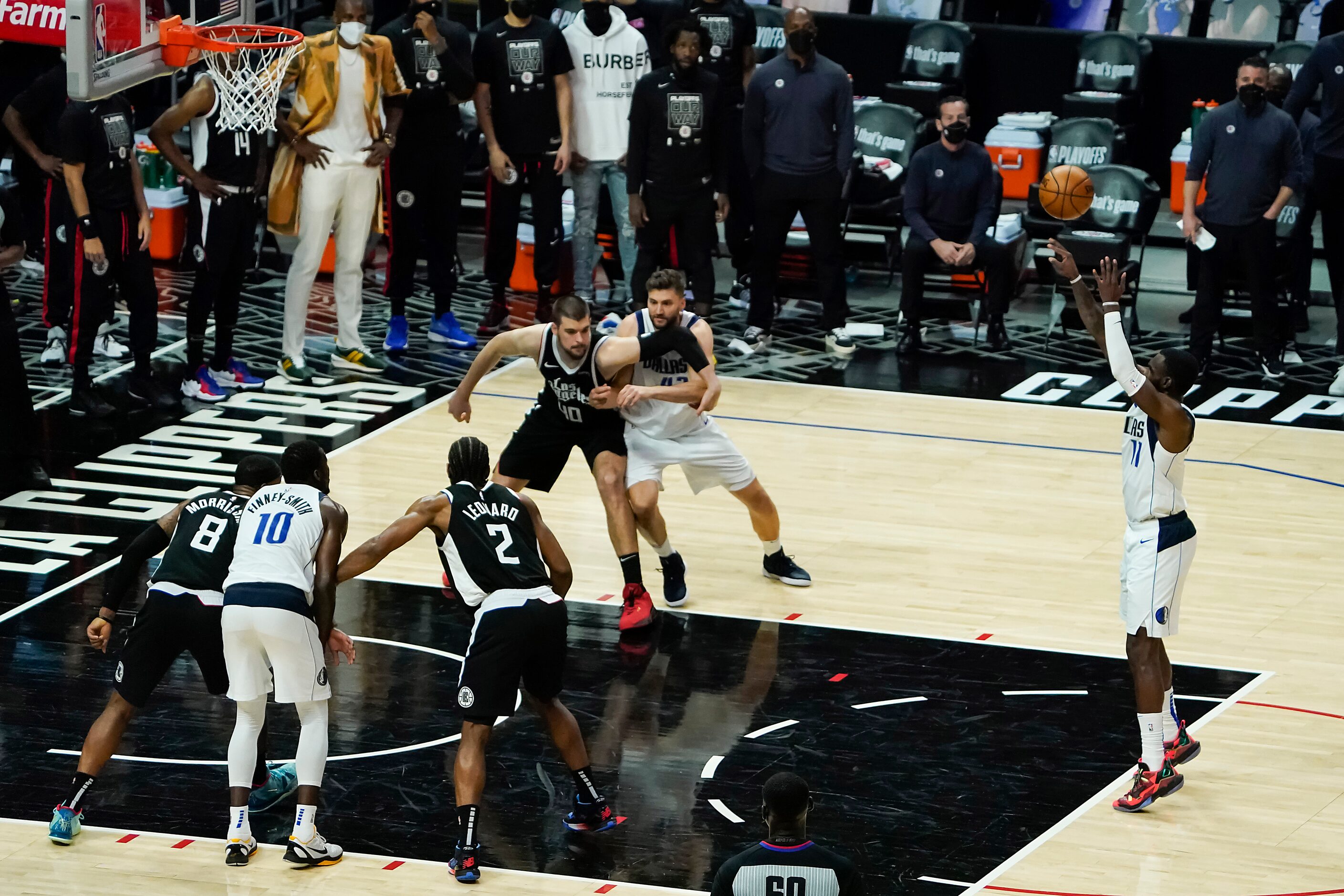 Dallas Mavericks forward Tim Hardaway Jr. (11) hits the second of two free throws to give...