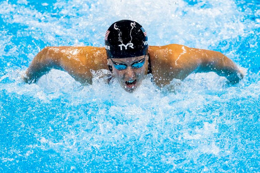 Dana Vollmer of the United States swims to a bronze medal in the women's 100m butterfly...