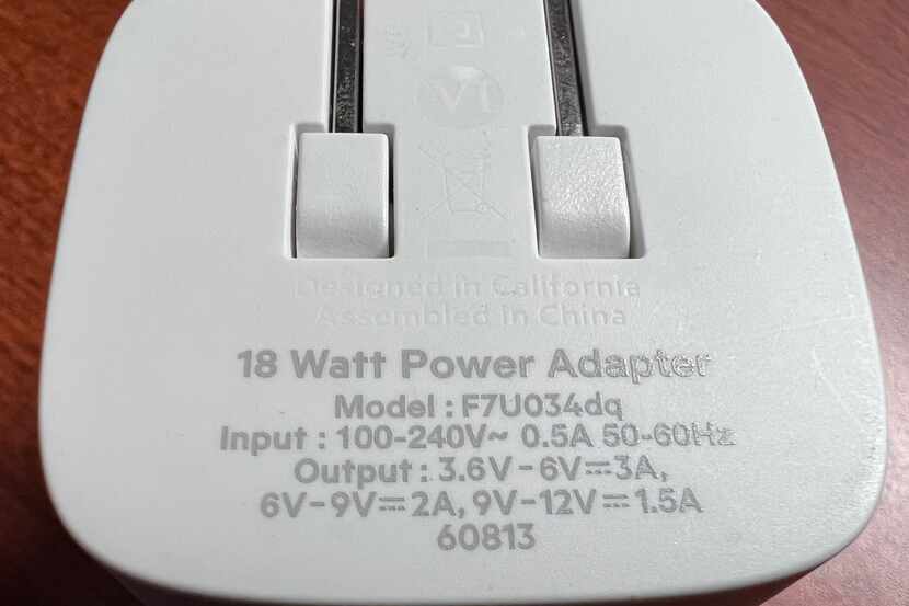 Every USB charger has some small print to tell you how much power is provided.