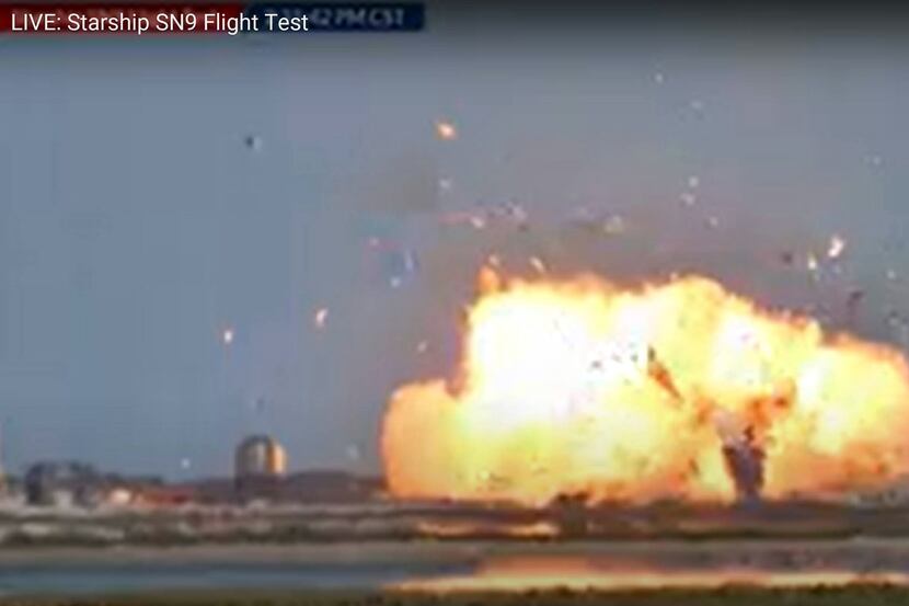 This still image taken from a Space X video shows the Starship SN9 exploding on landing as...