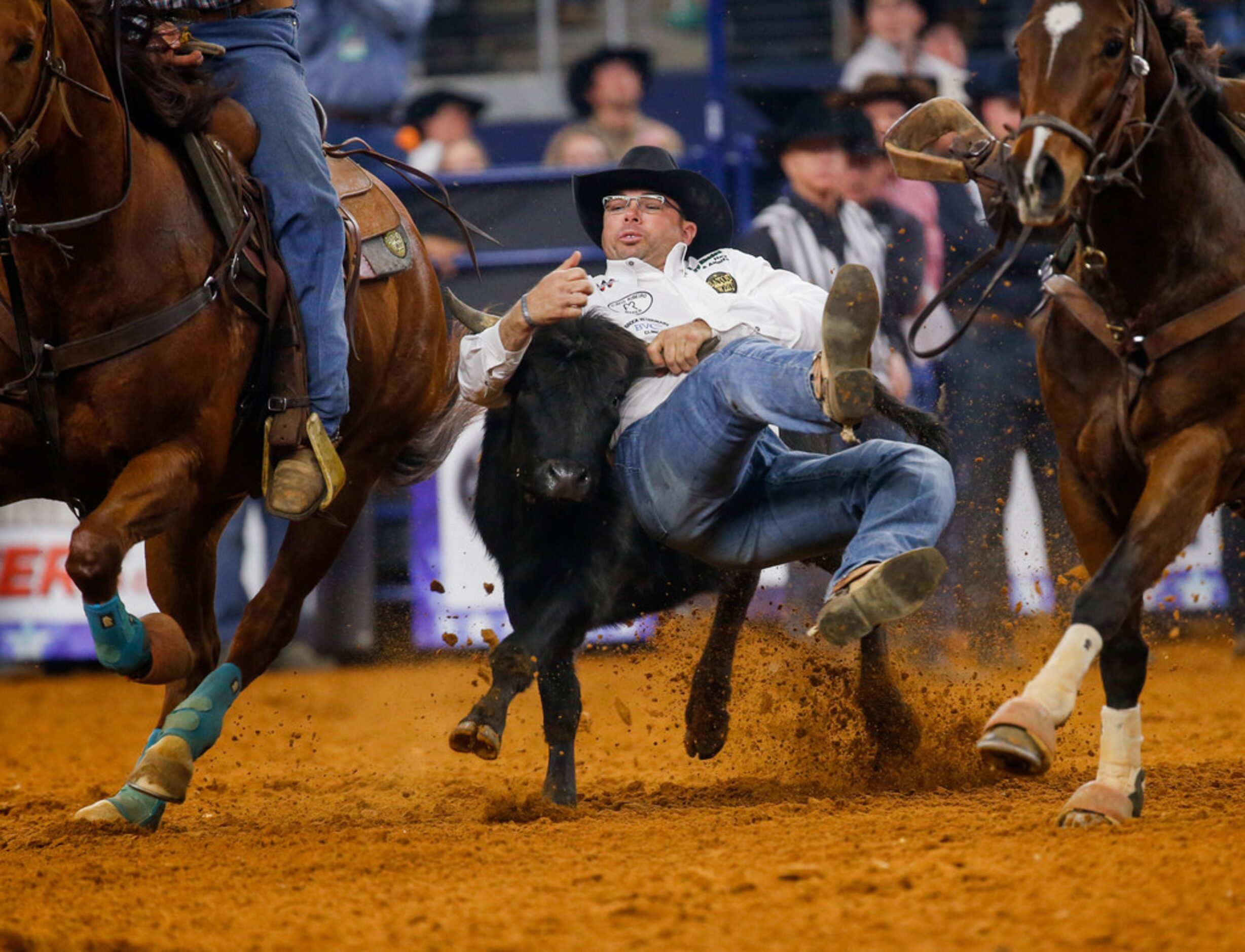 Matt Reeves of Cross Plains, TX competes in the steer wrestling competition of RFD-TV's The...