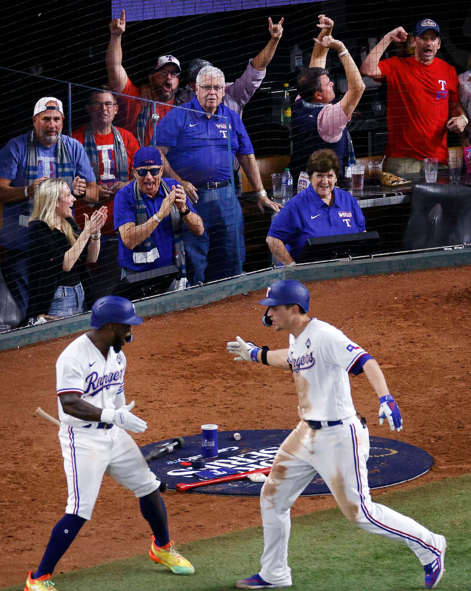 Texas Rangers shortstop Corey Seager (5), right, celebrates with Texas Rangers right fielder...