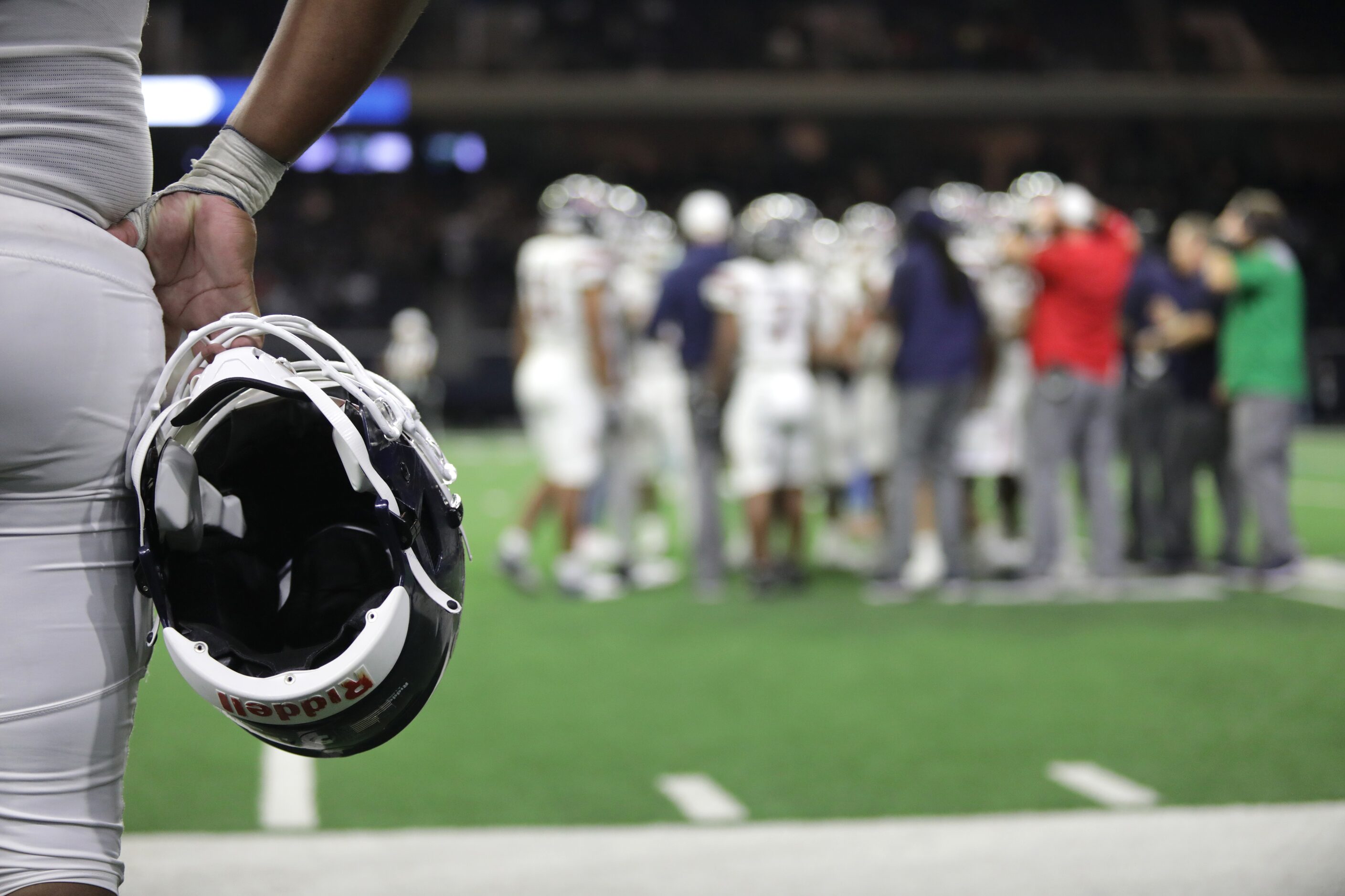 Denton Ryan huddles during a time out in a game against Frisco Lone Star high school at the...