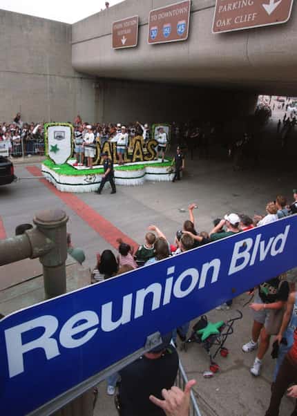 One of many floats filled with Dallas Stars players makes its way down Reunion Blvd. during...