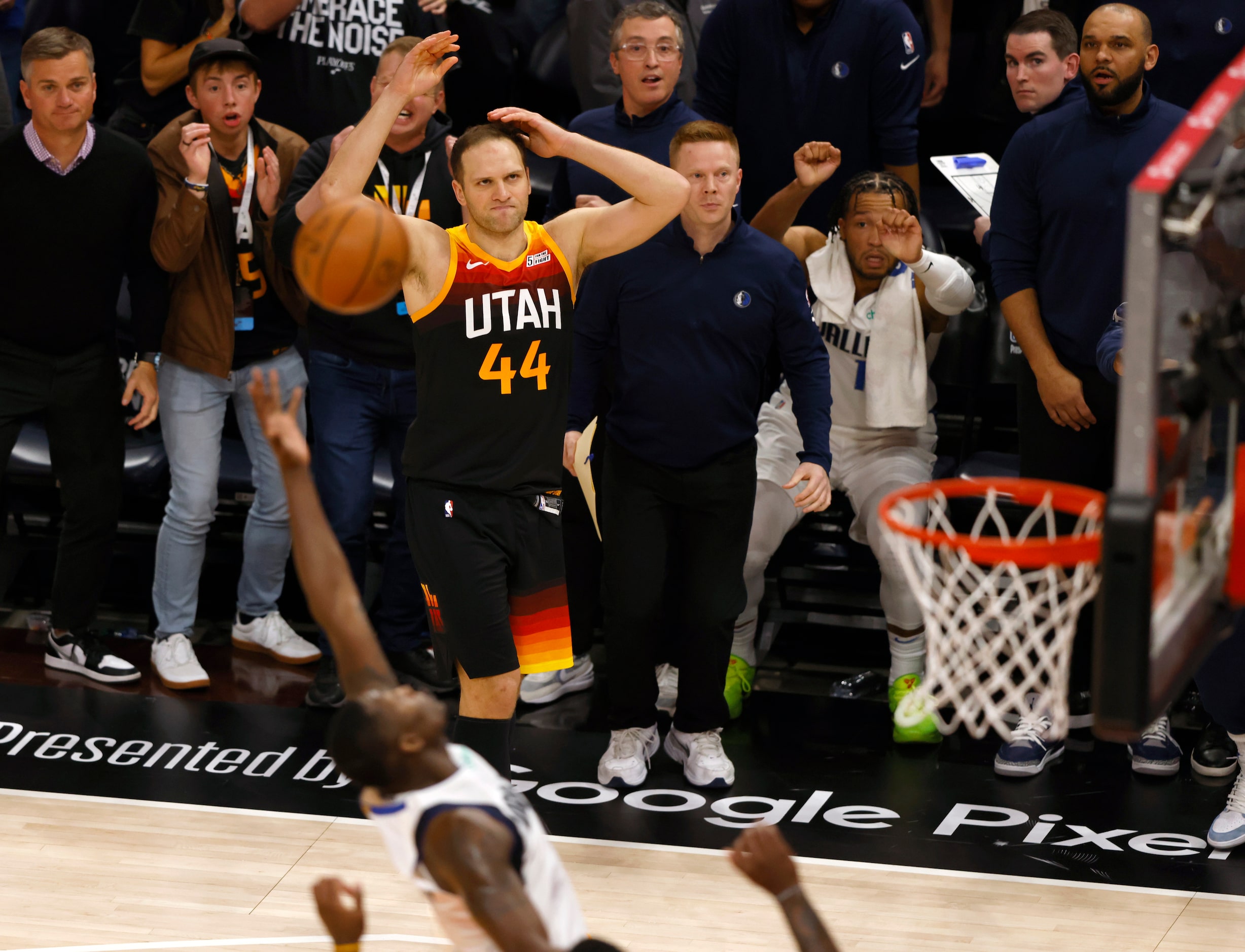 Dallas Mavericks bench Utah Jazz fans react after Utah Jazz forward Bojan Bogdanovic (44)...