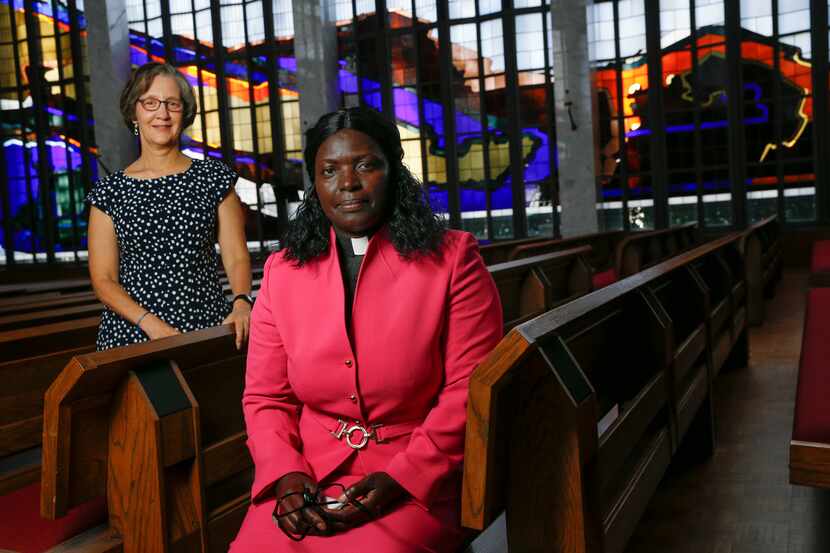 The Rev. Mary Miriti (right) with her longtime friend Wendy Campbell in the sanctuary of...