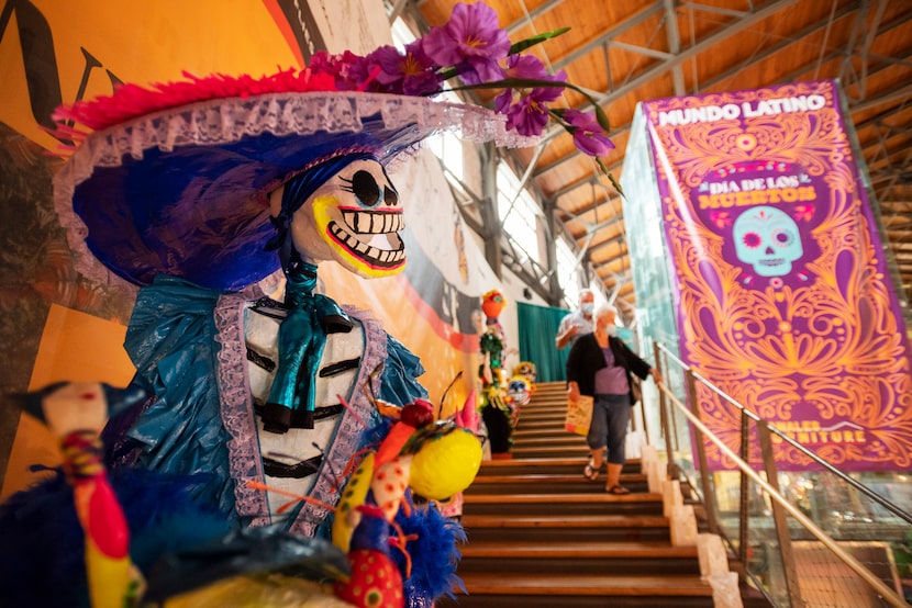 A large calavera decorates the stairwell that leads to the main exhibit hall celebrating Dia...