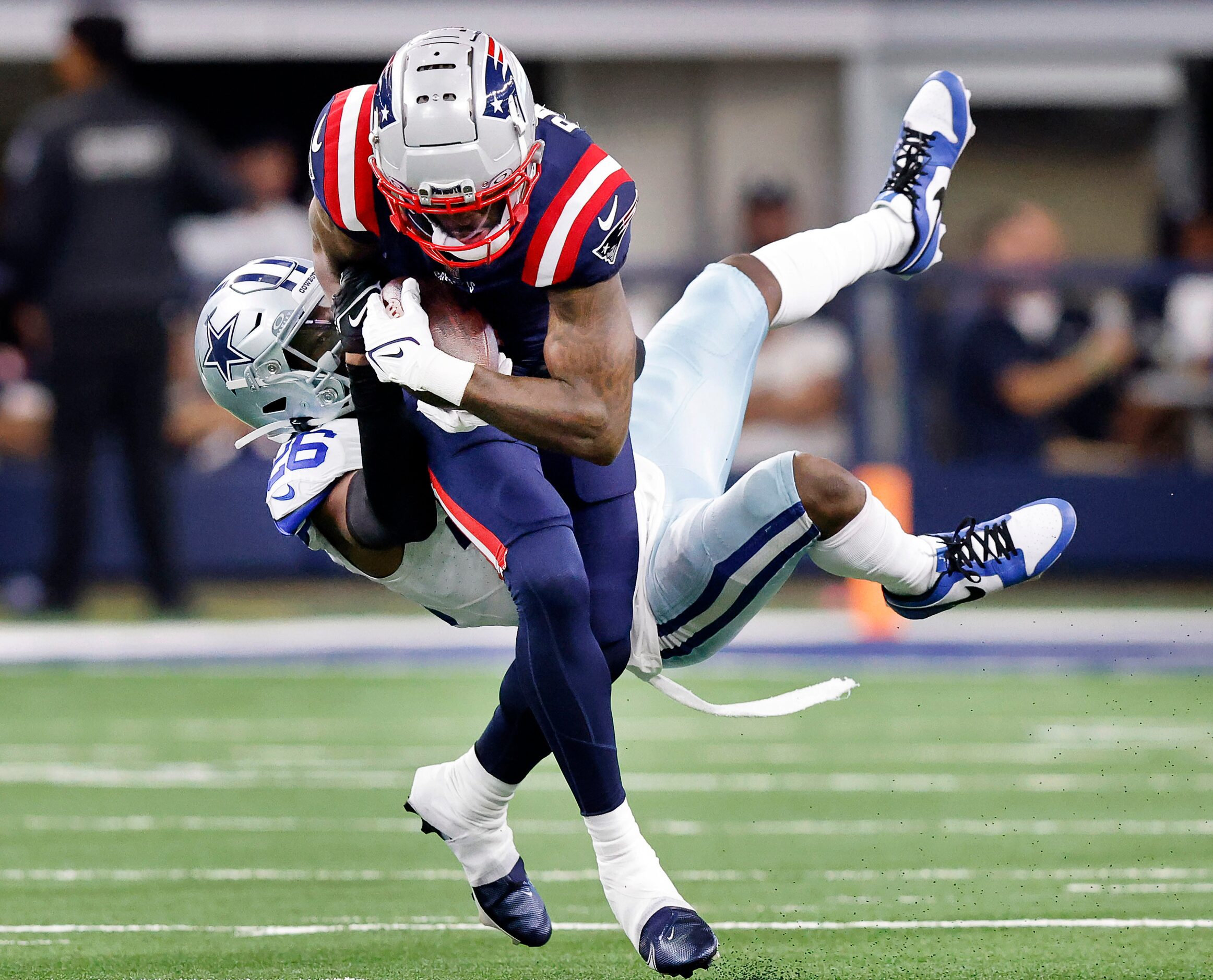 New England Patriots wide receiver DeVante Parker (1) is taken down by Dallas Cowboys...