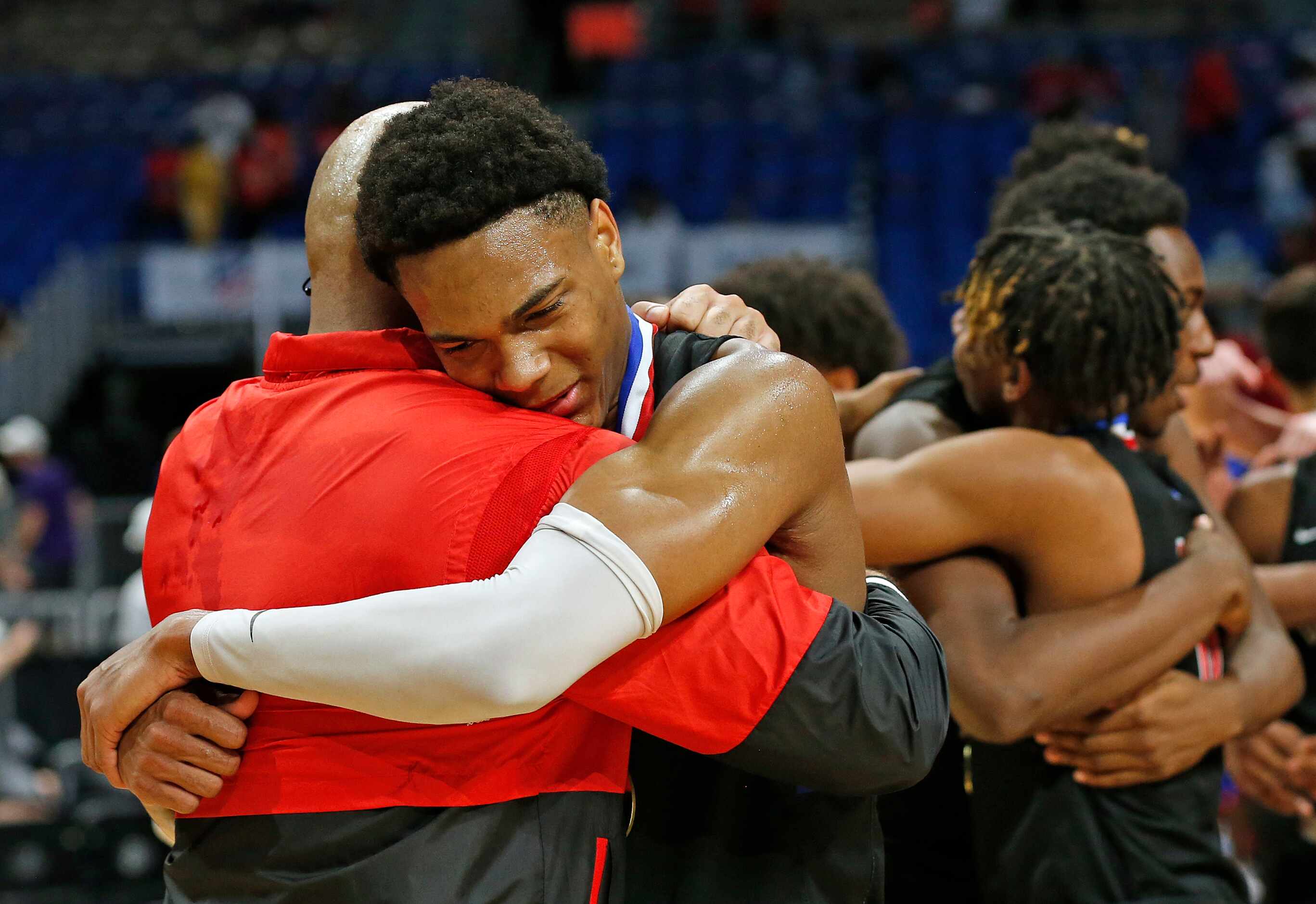 Duncanville Zhuric Phelps #0 is congratulated by Duncanville head coach David Peavy. UIL...