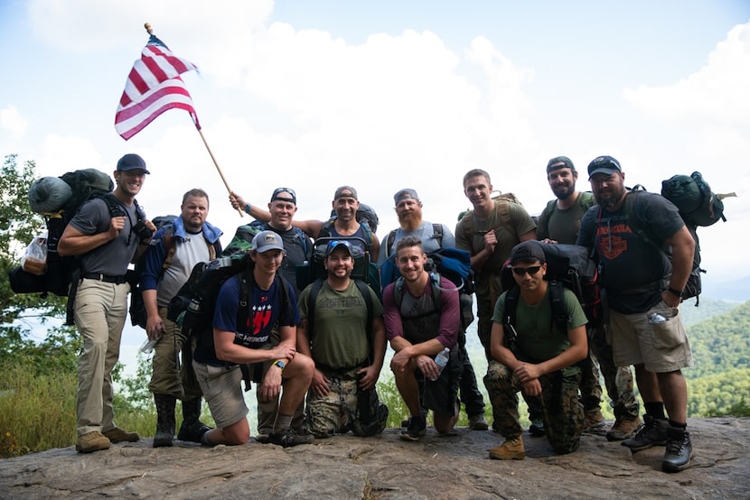 Power Home Remodeling workers pose for a group shot during a Power Veterans' Initiative hike.