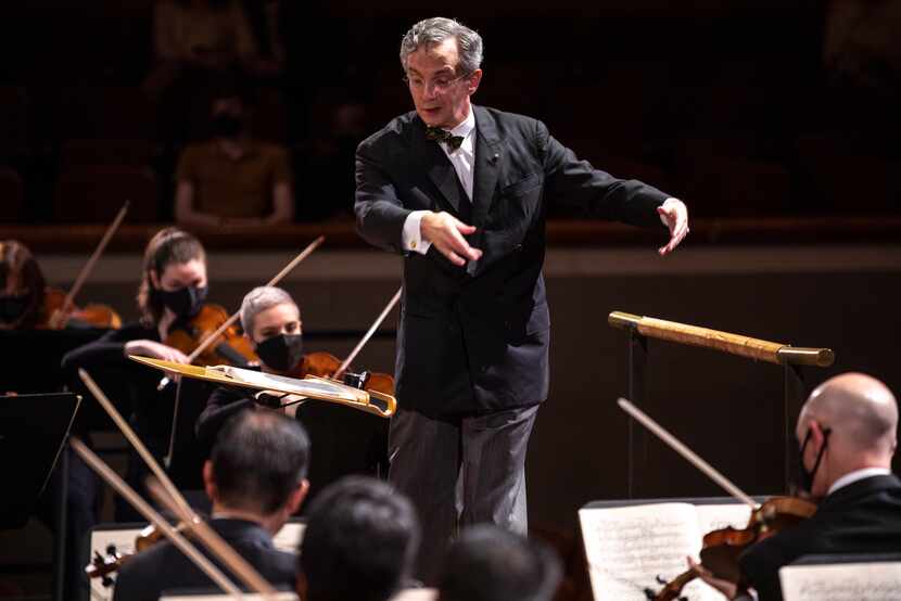 Dallas Symphony Orchestra music director Fabio Luisi conducts members of the DSO and...