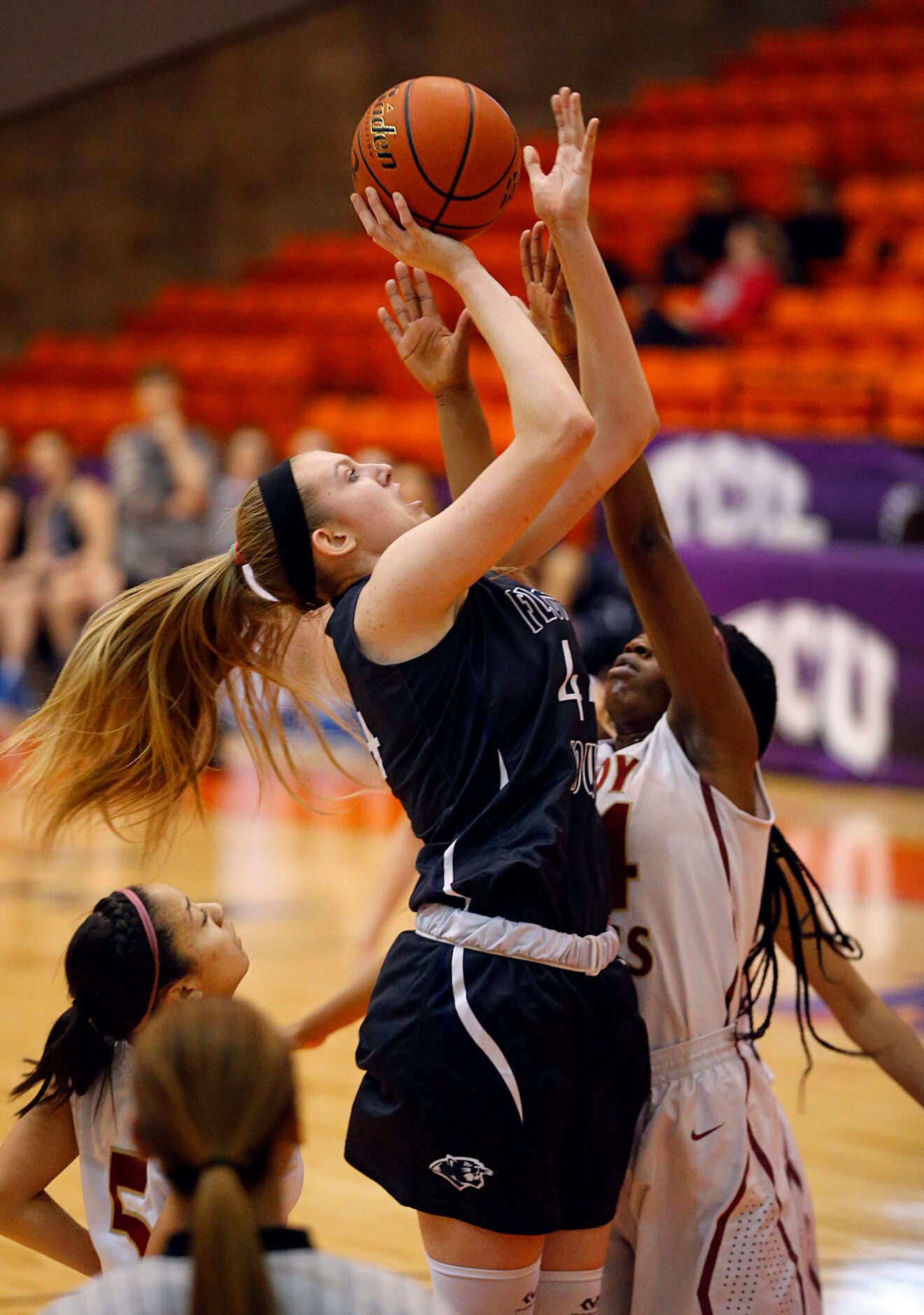 Flower Mound center Lauren Cox (44) puts up a shot against El Paso El Dorado forward Adeola...